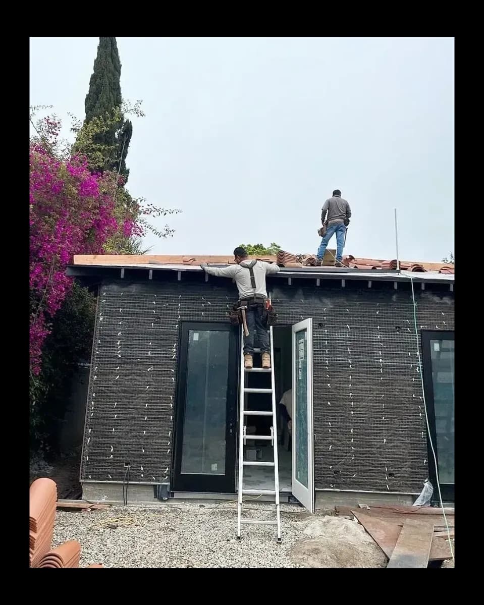HomeJobDone roofing crew installing clay tile roof on a Portland Oregon home